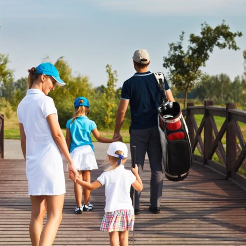 bigstock-Family-Of-Golf-Players-Walking-82259504